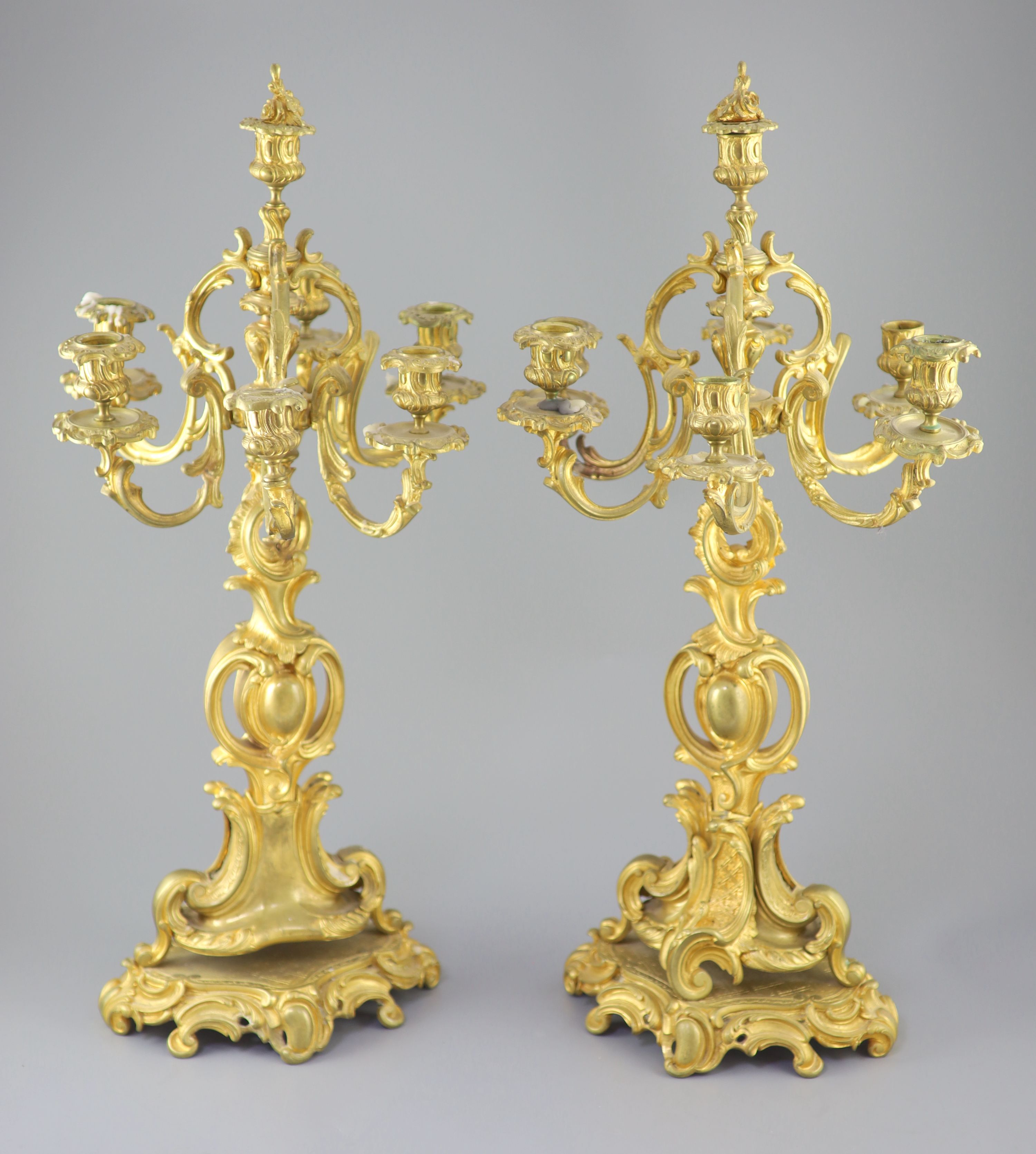 A pair of late 19th century French Louis XV style ormolu seven light candelabra, height 26in.